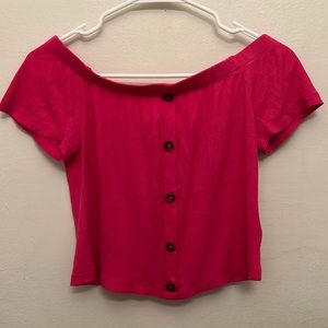A pink crop top